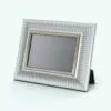 Classic Revit Picture Frame Family rendered in silver and gold colors.
