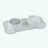Bone Shaped Revit Dog Bowls Family rendered in black and white (ambient occlusion style). This family comes with pre-configured materials so you can just insert it in your Revit project and hit the render button.