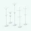 Radial Pegs Coat Rack Revit Family in different sizes and variations to showcase its parametric flexibility. While these images don't show any materials (ambient occlusion), this decoration Revit family does come with pre-built materials.