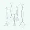 Waves Coat Rack Revit Family in different sizes and configurations to showcase its parametric nature. This Revit decor family comes with pre-configured materials (even if it's shown in black and white in here).