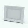 Picture Frame Revit Family With Detail Dots in 3D and rendered in black and white to see the details better. This family can be used as either a tabletop picture frame or as a hanging wall picture (art piece). Flexible and lightweight, this fully parametric Picture Frame Revit Family is the perfect complement to make your renders look livable and cozy.
