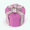 3D Gift Box Decoration Revit Family rendered in bright pink and with an intricately decorated ribbon. Ideal for stores, window displays and more, this Revit decor family will certainly make some heads turn.