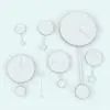 Modern Pendulum Wall Clock Revit Family in different sizes and configurations to showcase its parametric flexibility.