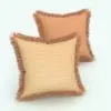 Square Revit Cushion Family With Fringe rendered in 3D with a light colored material and darker fringe. Ideal for classic interior design projects, this Revit cushion will make your 3D renderings stand out in just a few clicks. This family is fully parametric and easy to use, so don't wait any longer and get this Square Revit Cushion Family With Fringe today.