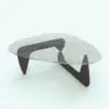 Modern Triangular Coffee Table Revit Family in 3D and rendered with a dark chocolate wood finish and a glass top. Ideal for living rooms, bedrooms, hotel rooms and more, this fully parametric and easy to use coffee table Revit family will make your spaces stand out in just a few clicks.