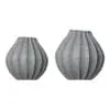 Curved Sprocket Flower Vase 3D Model in front view and displayed in wireframe to show the clean and professional topology of both vases. Ideal for residential, commercial or hospitality settings, this flower vase 3D model will elevate your renderings to new heights.